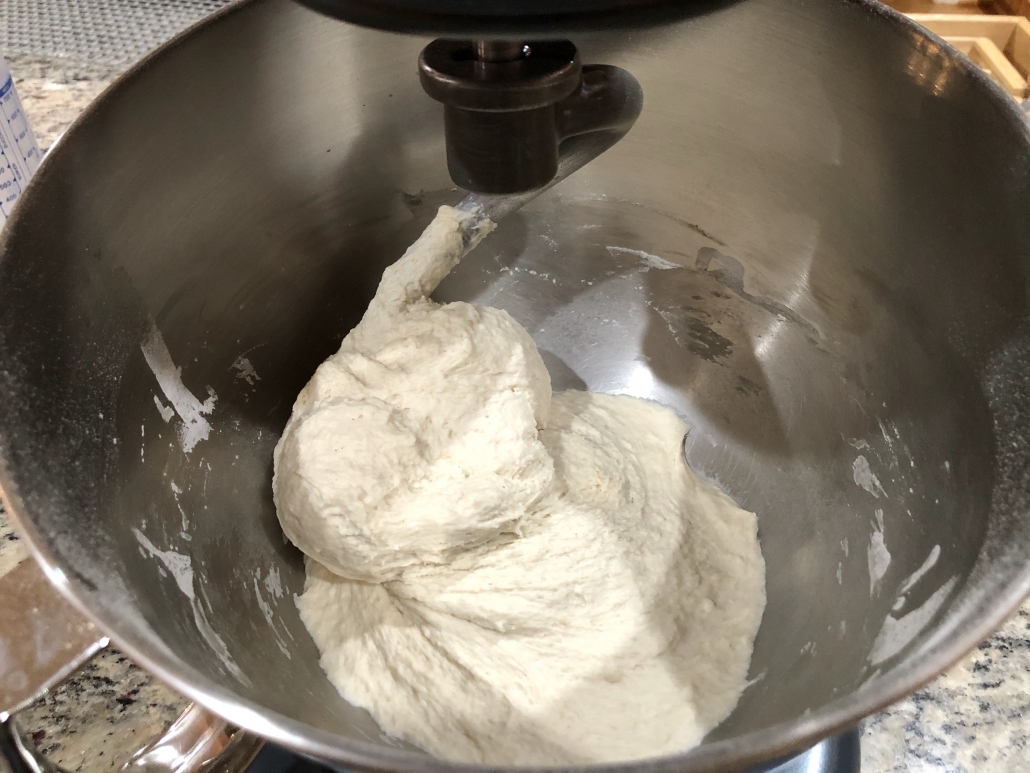 Kneading the dough for the homemade baguette recipe