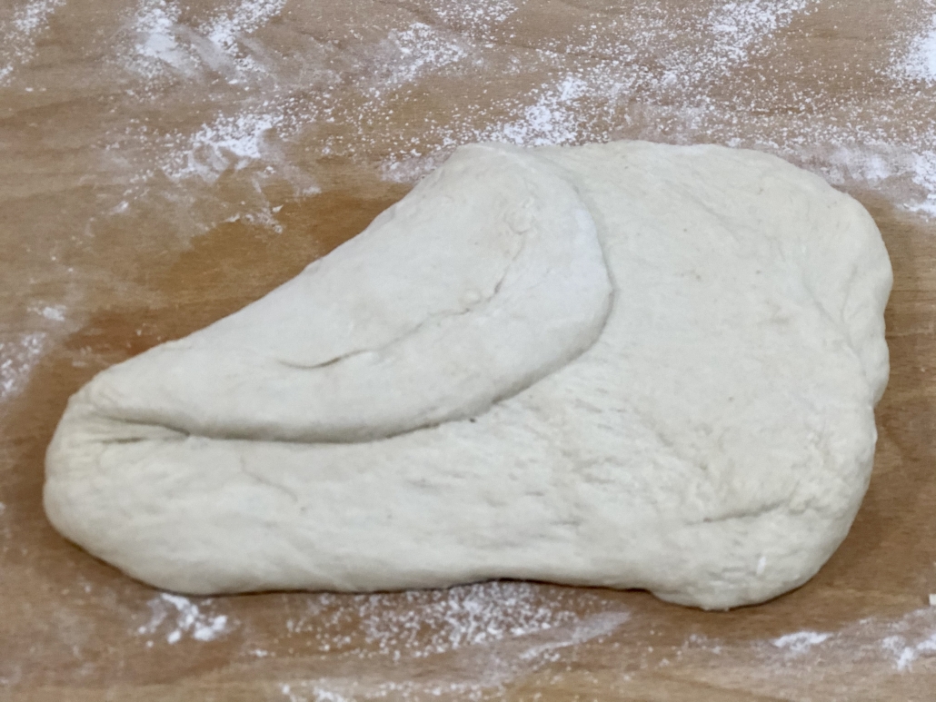 Folding of the dough for the homemade baguette recipe