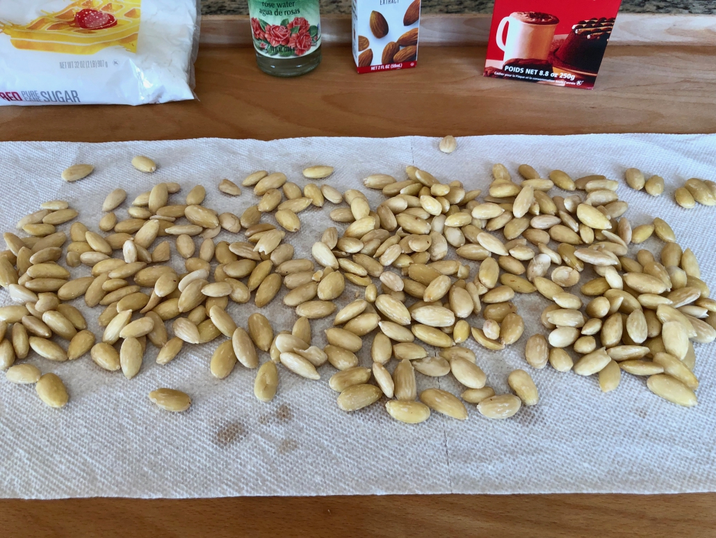 Peeling the almonds