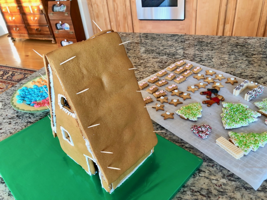 Finishing the building of the gingerbread house