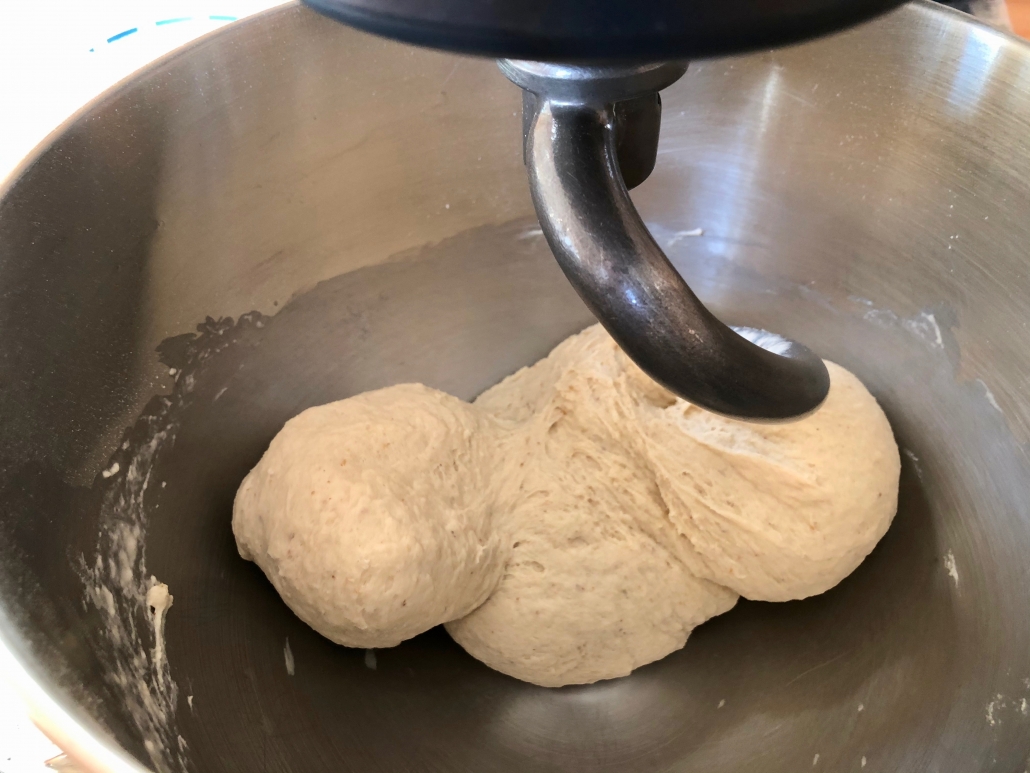 Kneading the dough for the homemade flavored bread