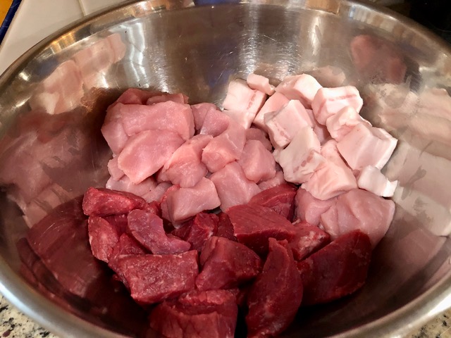 Cutting the meat for the Homemade German Leberkãse Fleischkäse